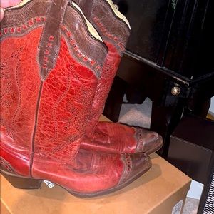 Red leather cowgirl boots bought in Vegas